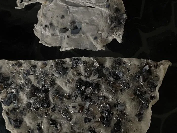 Gelatine sheets set with shell fragments
