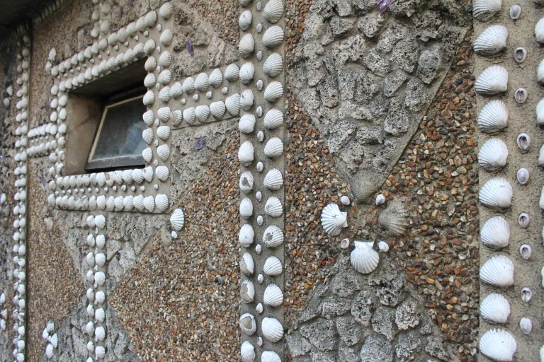 Close-up of a wall set with white shells in diamond patterns